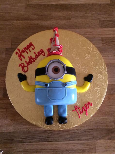 Minion cake strawberry butter cake with strawberry buttercream was the strict instructions of my 3 year old client who requested this minion cake for his birthday. Minion birthday cake for a one year old boy. Fondant cake art | Minion birthday cake, Minion ...
