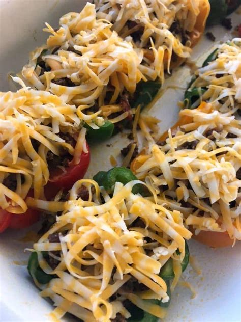 Making chicken stuffed peppers is so easy you'll make this frequently! Keto Mexican Stuffed Peppers | Kasey Trenum