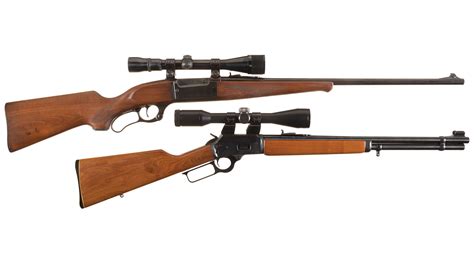Two Lever Action Rifles With Scopes