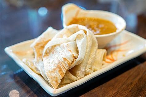 I think i'm starting to get the roti cooking okay. Roti Canai with Chicken Curry - Mamak Malaysian Restaurant ...