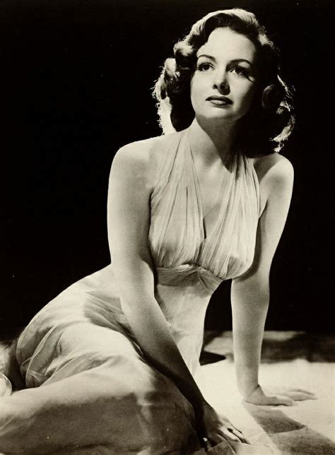 A Black And White Photo Of A Woman In A Dress