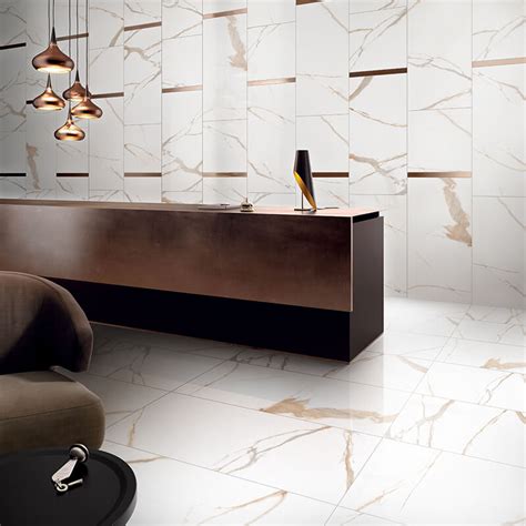 The tile is suitable for use on walls but is not suitable for use on floors. Calacatta White Gold Polished Porcelain Tile | Realgres