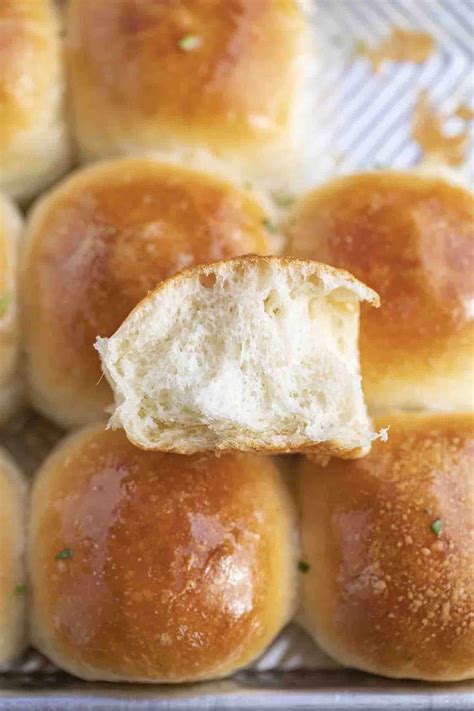 a close up of some bread rolls on a pan