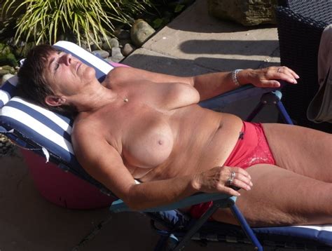 Big Boobed Amateur Gilf Flashing And Sunbathing Pics Xhamster