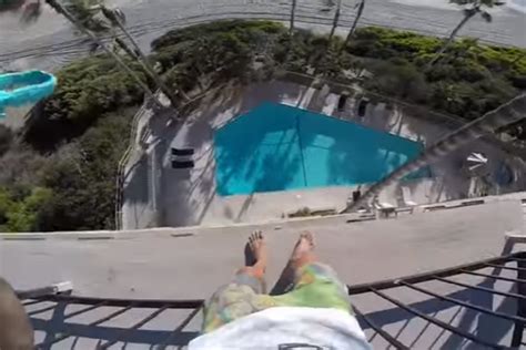 Dude Jumps Off 4th Floor Balcony Into Swimming Pool Video