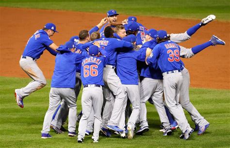 the chicago cubs celebrate after defeating the cleveland indians 8 7 in game seven of the 2016