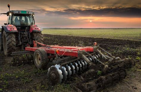 Tractor Plowing A Field Stock Photo Image Of Cultivated 61732294