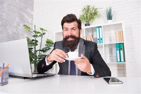 Discuss Business Over Coffee Man Handsome Boss Sit In Office Drinking