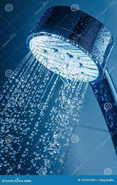 Shower Head With Water Stream On Blue Background Stock Photo Image Of