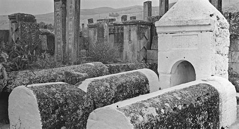 heavy flood uncovers medieval cemetery in iran