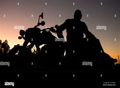 Man Motorcycle Silhouette Hi Res Stock Photography And Images Alamy
