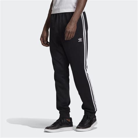 They're a piece of adidas history. adidas Adicolor Classics Primeblue SST Track Pants - Black ...