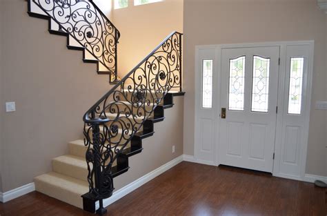 Wrought iron newels coordinate beautifully and flow seamlessly with iron balusters designs. Wrought Iron Stair Railings for Creating Awesome Looking Interior - HomesFeed