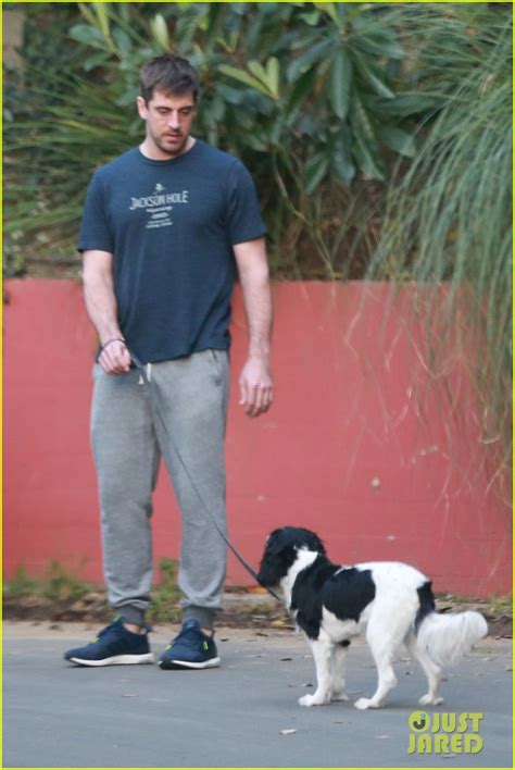 Photo Aaron Rodgers Takes Girlfriend Olivia Munns Dog For A Walk 11