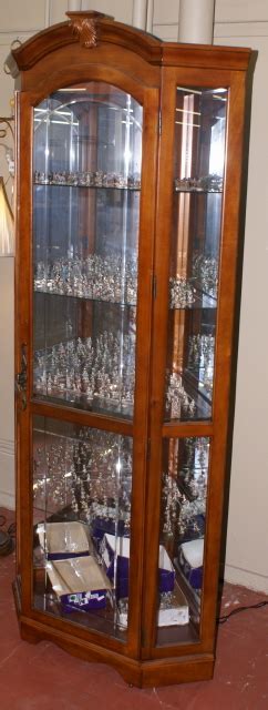 Maybe you would like to learn more about one of these? Lighted etched glass front corner curio cabinet / display ...