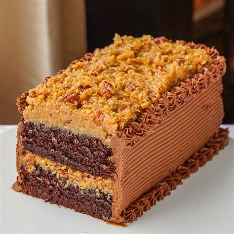 Three layers of moist chocolate cake that are stacked, one on top of another, with a sweet a few extra notes on ingredients. German Chocolate Cake. The easiest & best recipe I've ...