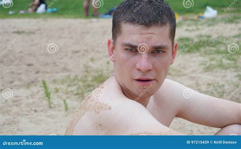 Guys Relax On The Beach Standing On The Shore Stock Image Image Of