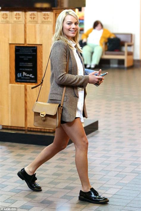 Margot Robbie Flaunts Her Slim Legs In Tiny Shorts Before Catching