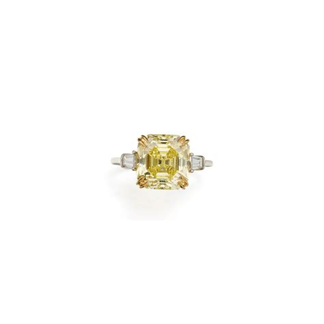 128 Fancy Intense Yellow Diamond And Diamond Ring