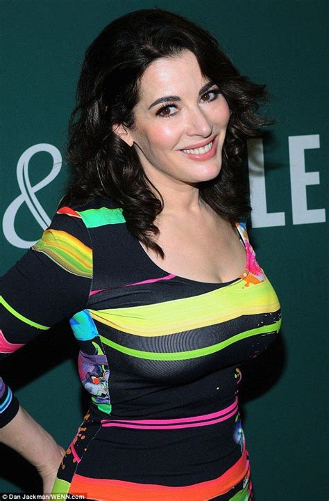 talk about attention grabbing nigella lawson stands out in multicoloured skintight dress as she