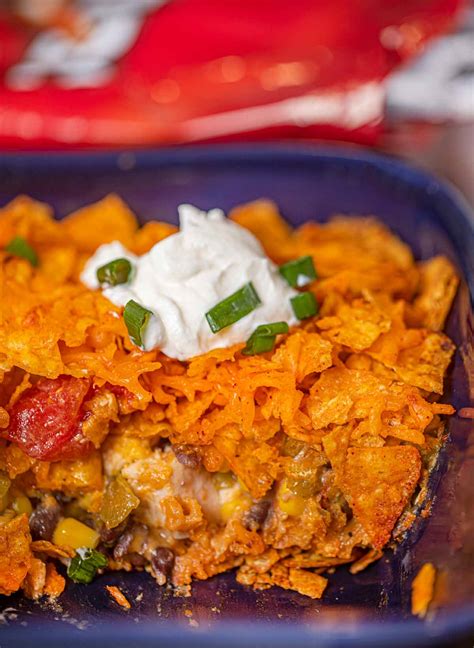 Stir chicken, 1 cup mexican cheese blend, salsa, cream of mushroom soup, cream of chicken soup, and sour cream together in a bowl. Doritos Chicken Casserole Recipe (Kid Friendly!) - Dinner ...