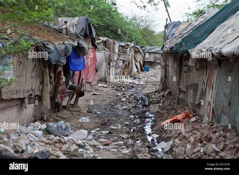 Poverty Living In Tehkhand Slum Delhi India Homes On S Lane With