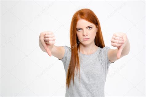 Sad Disappointed Woman Showing Thumbs Down With Both Hands Stock Photo