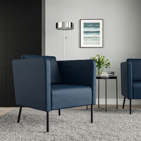 The back cushion can be moved around to fit your sitting style. EKERÖ Armchair, Skiftebo dark blue - IKEA
