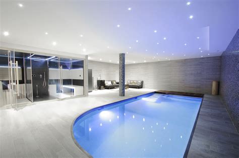 While not as enjoyable as an outdoor pool in the backyard on a sunny day, they're a great option if you love swimming and live in a colder climate. Cool Indoor Pool Concepts and Designs Home to Z | Indoor ...