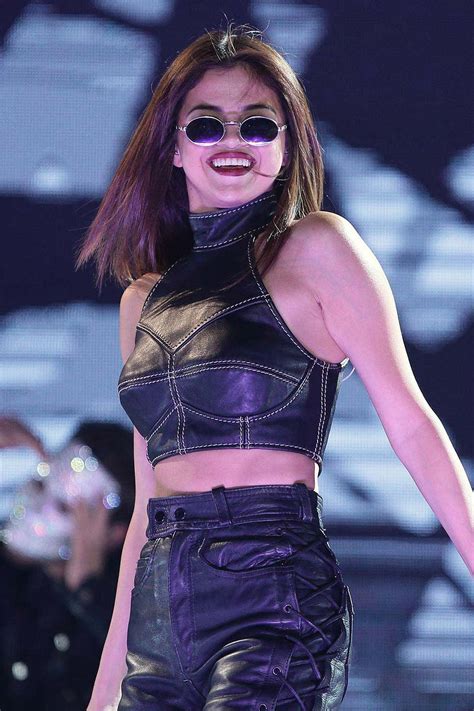 Selena gomez is an american singer and actress. Selena Gomez performs at Revival Tour - Leather Celebrities