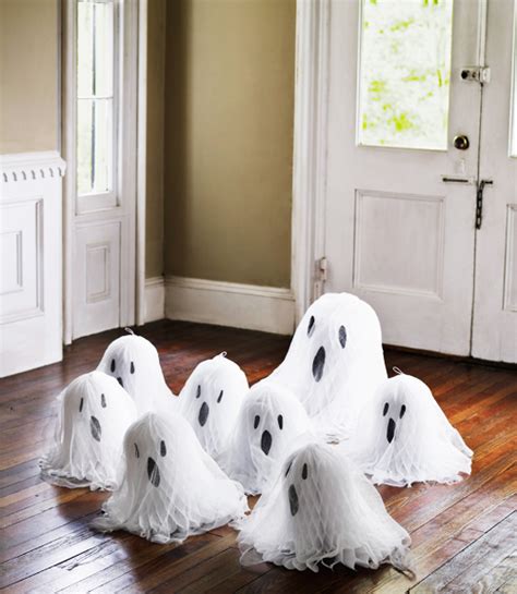 20 Diy Ghoulish Halloween Ghost Decorations Shelterness