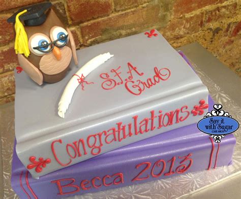 Have you seen photos of unicorn cakes, and wished you could make your own, but don't want to deal with fondant? Graduation books with fondant owl topper. | Book cake ...
