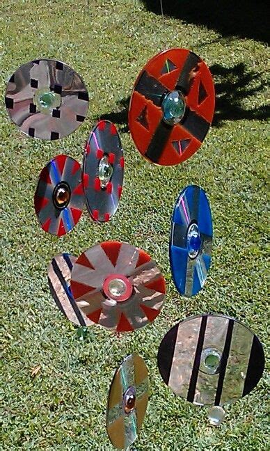 Recycled Cds Put Tape On Them Paint Them Peel Off Tape