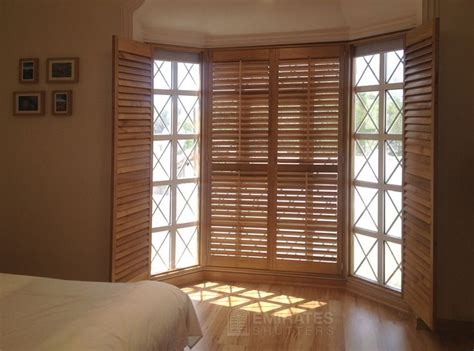 We have two huge windows that need plantation shutter. Rimini Blinds | Brown Shutters | Bedroom | Made to measure ...