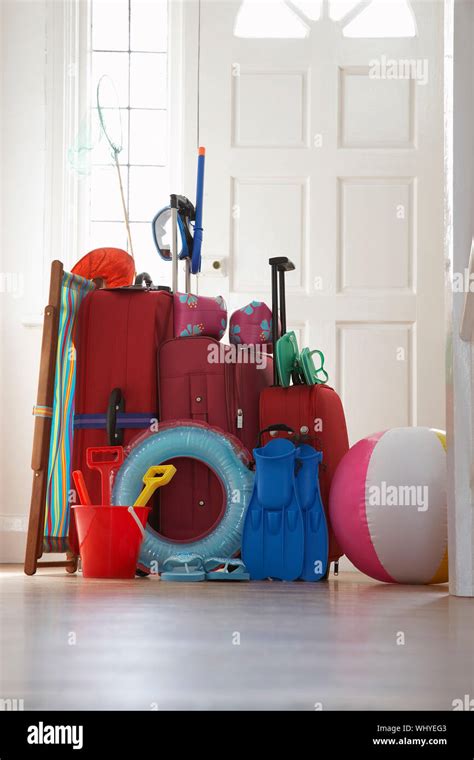 Packed Luggage Standing In Hallway Stock Photo Alamy