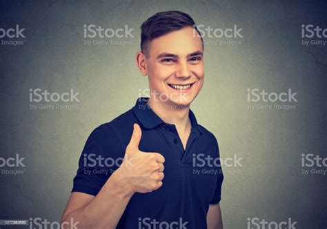 Happy Handsome Man Showing Thumbs Up Stock Photo Download Image Now