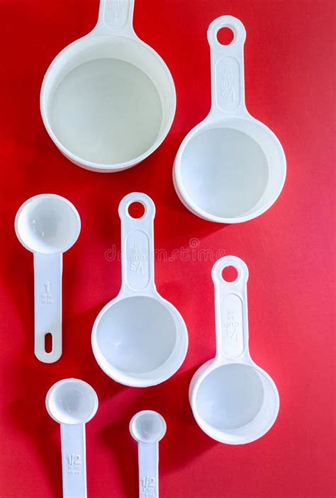 Set Of White Measuring Cups Measuring Spoons Use In Cooking Lay On