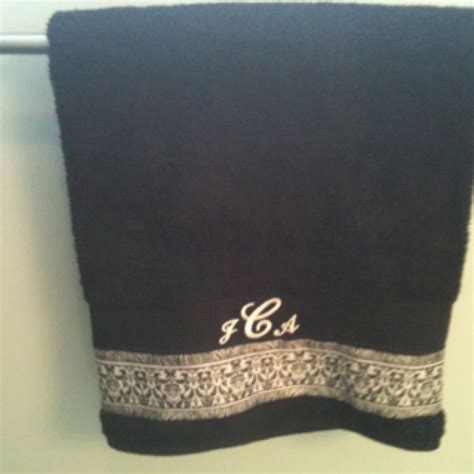 Stay clean and comfortable with our collection of bath towels and washcloths. Black bath towel sew ribbon and iron on monogram for a ...