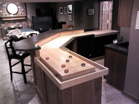 Table top / bar games. This shuffleboard bar was built with angles. The bank ...