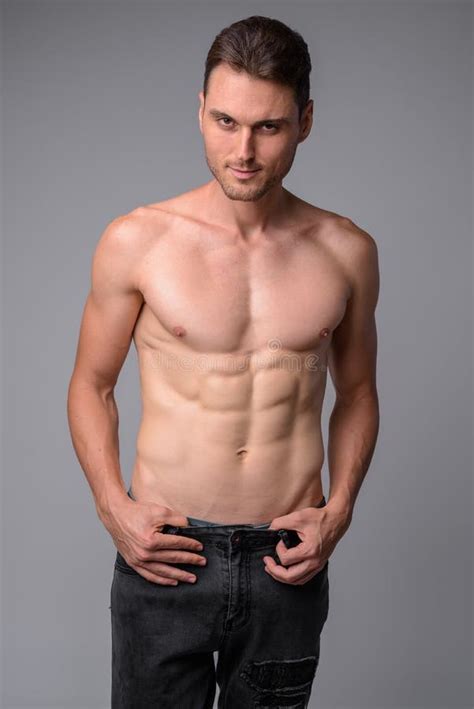 Studio Shot Of Handsome Muscular Man Shirtless Stock Photo Image Of