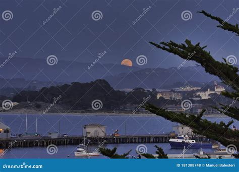 Horizontal Photo Of A Super Moon Rising Over Monterey Bay Stock Photo