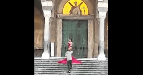 Outrage As Model Poses Naked On Cathedral Steps In Front Of JESUS MURAL