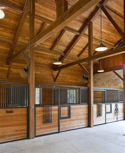 We use expert tradesmen to fabricate horse barn components using heavy duty, no rust, aluminum so your stall components will never rust and are easy to maintain. i like the overhead lighting horse barn lighting ideas ...