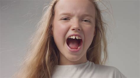 Closeup Portrait Of Young Girl Shouting Stock Footage Sbv 336612486