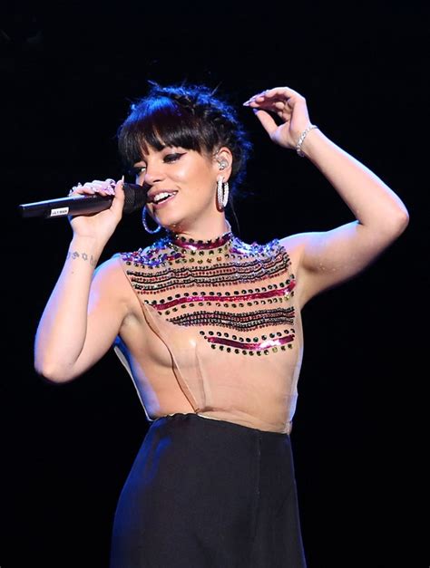 lily allen flashes side boob and pasties in sheer top during concert performance—take a look