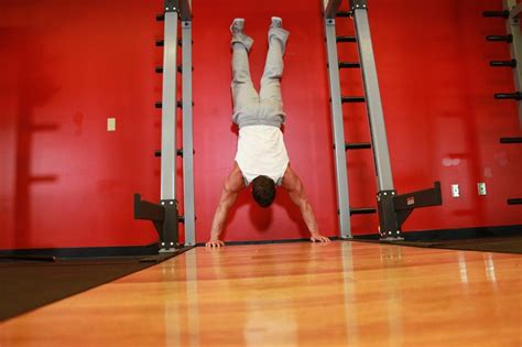 Handstand Push Ups — How To Do It Video Of Performing Technique