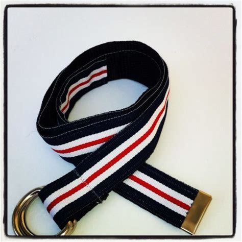 Leatherback ribbon belts go perfectly with sailing, golf, and boat shoes. Navy with red stripe ribbon belt - Land of Bows