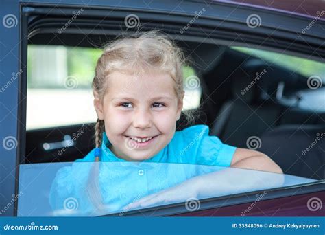 Happy Little Girl Looking Out Of A Car Window Stock Photo Image Of