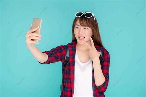 Cheerful Asian Girl Takes Selfie On Vacation Style People Wearing Photo Background And Picture