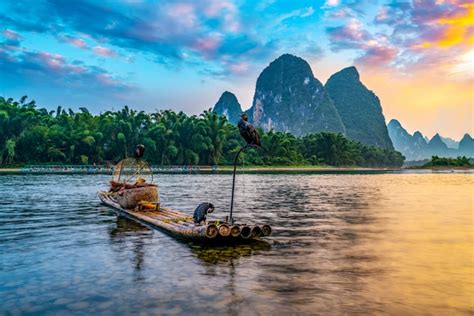 Premium Photo Landscape And Bamboo Rafts Of Lijiang River In Guilin
